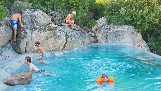 Kids playing in a Biodesign pool