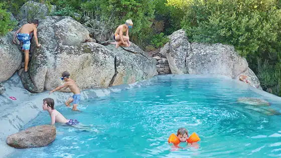 Kids playing in a Biodesign pool